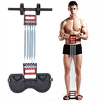 Man using a resistance band trainer with a white background