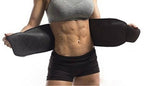 Person using a black waist trainer on a white background