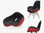 Red and black cushion on a chair with a white background