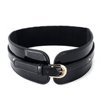 Black patent leather belt with a gold buckle on a white background