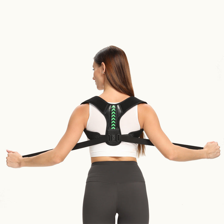 Person wearing a black posture corrector on a white background