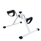 White exercise bike with black handles on a white background