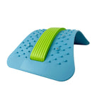 Blue and green foot roller on a white background