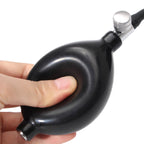 Black air pump held by a hand on a white background