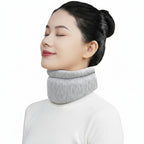 Woman wearing a gray neck pillow with product details on a beige background