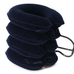 Navy blue inflatable neck pillow with carrying strap on a white background