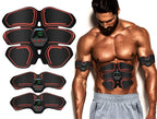 Man using an electronic muscle stimulator with gel pads and USB cable on a white background