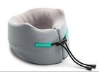 Gray neck pillow with a black strap and Tripal logo on a white background