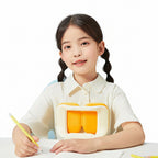 Young girl with braided hair wearing a white shirt with a yellow design, sitting at a table with a blue background.