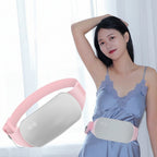 Woman wearing a smart hot compress device on her waist 