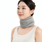 Woman wearing a gray neck brace with product details on a beige background