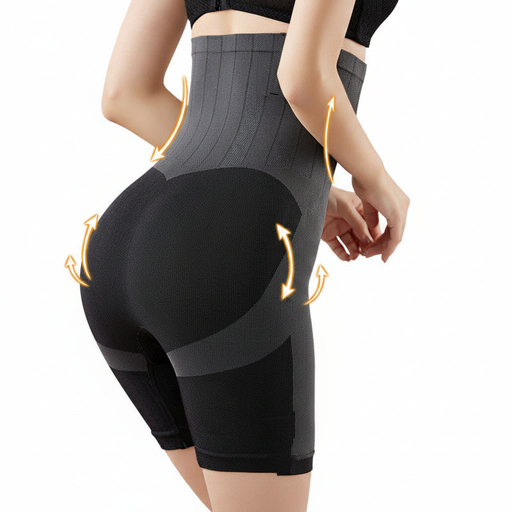 Person wearing black and gray compression shorts on a neutral background