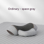 Gray neck pillow on a light gray background with 'Ordinary - space gray' text.