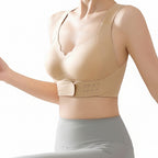 Beige sports bra worn by a model on a gray background