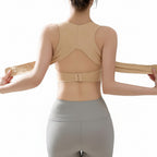Person wearing beige sports bra and gray leggings with text on a gray background